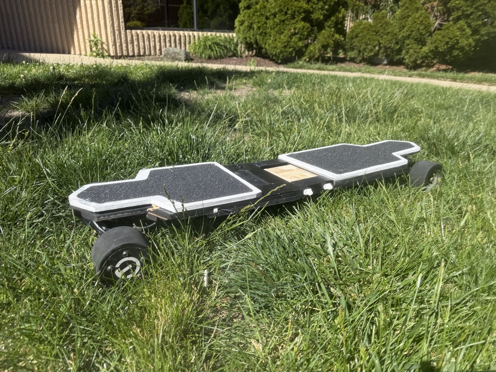 Zephyr board, unfolded, resting on grass